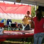 Contestants busy cooking and getting ready to serve their famous recipes!